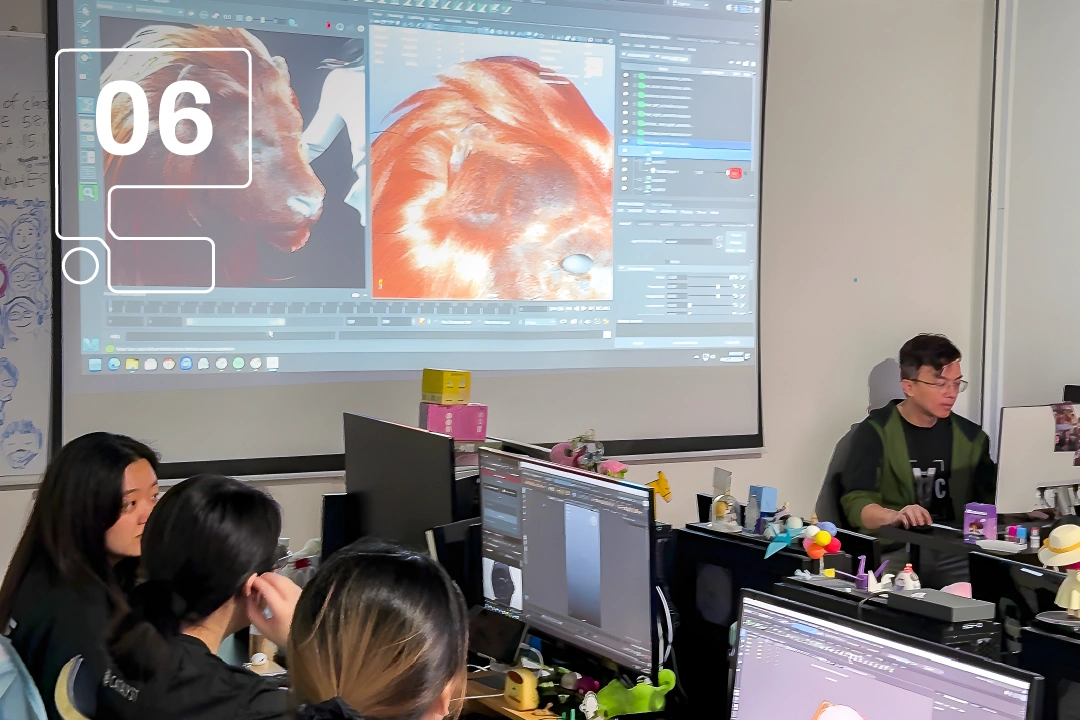 A classroom with students at computers, focusing on a large screen displaying detailed 3D modeling texture.