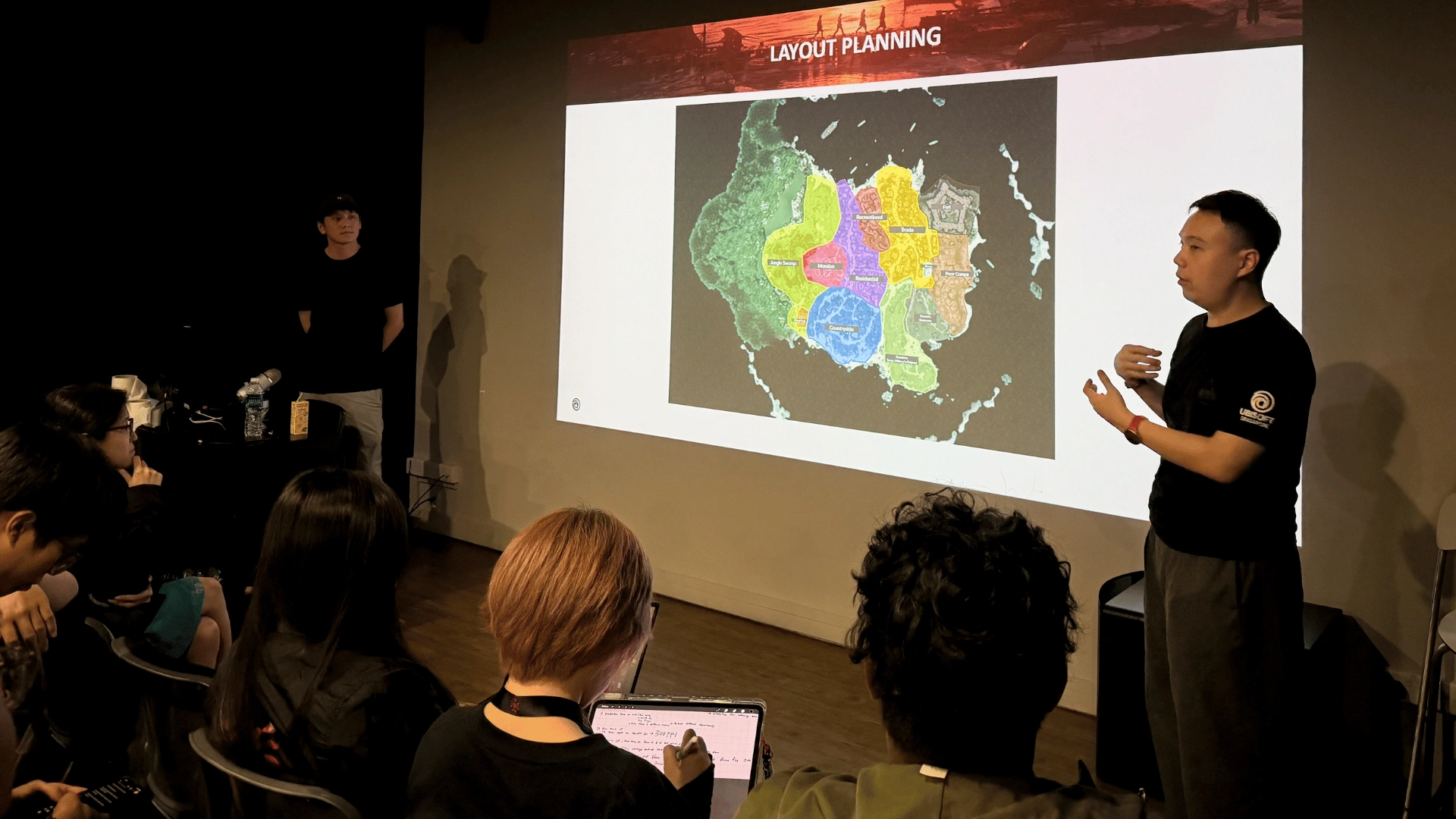 3dsense alumni and Ubisoft level artists presenting game world layout planning during the Summit Day 2026 industry talk