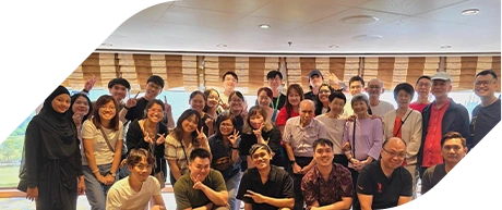 3dsense staff posing together inside a well-lit room with large windows, showcasing cheerful expressions and peace signs.